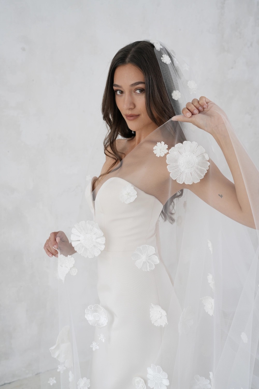 Model wearing a white dress. Photo 2